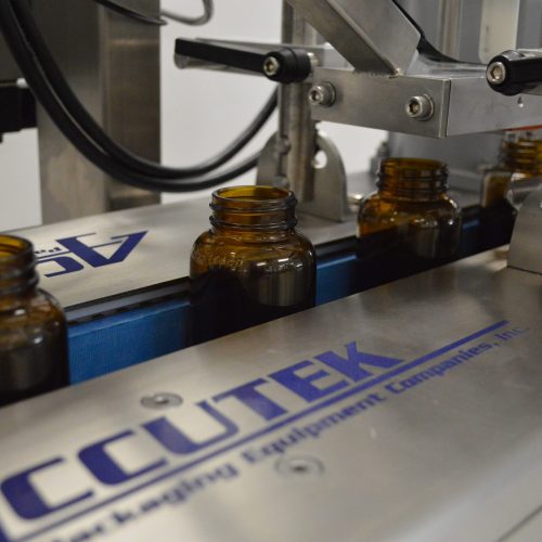 DESICCANT-INSERTER-MACHINE